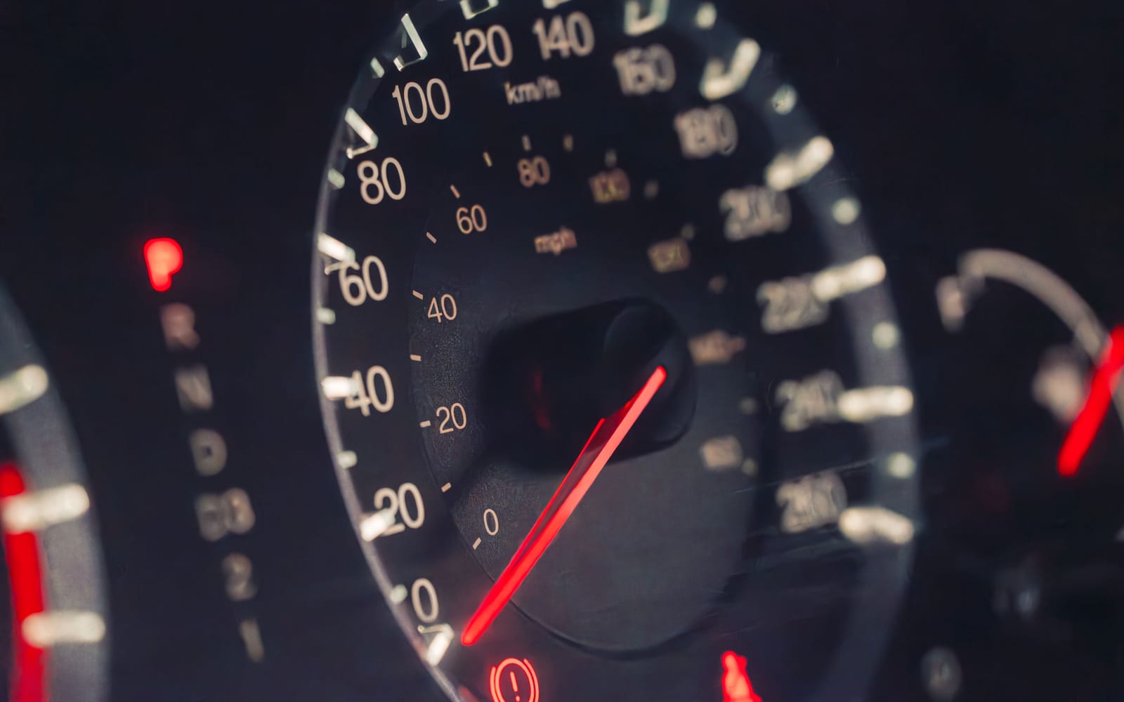 A close view of an analogue gauge dial with a needle against a numbered scale