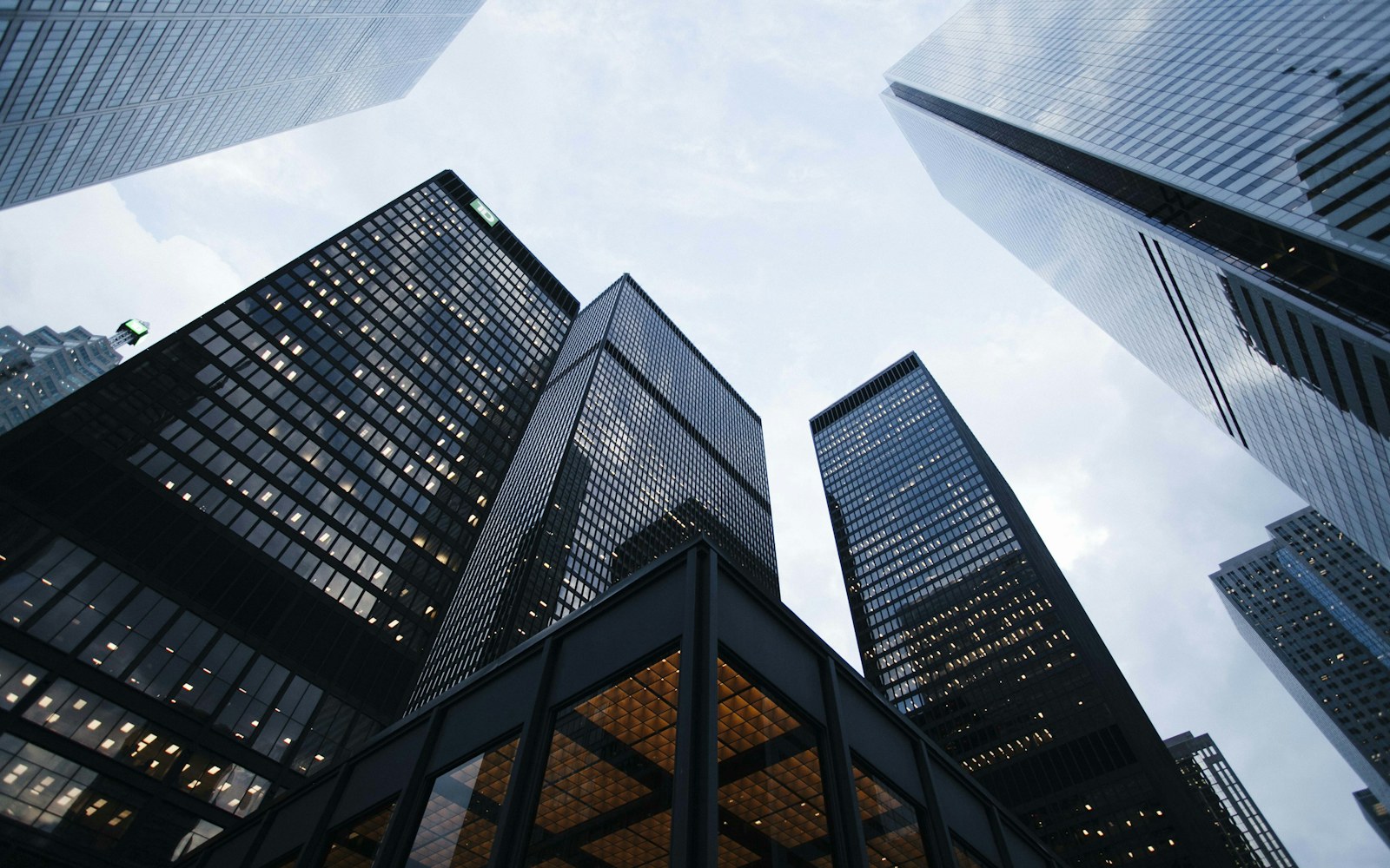 Glass office towers seen from street level