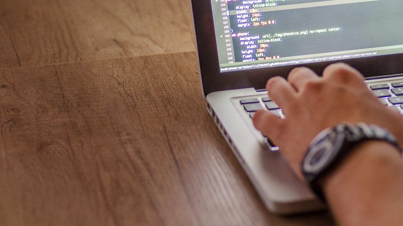 A developer working through an API specification on screen.