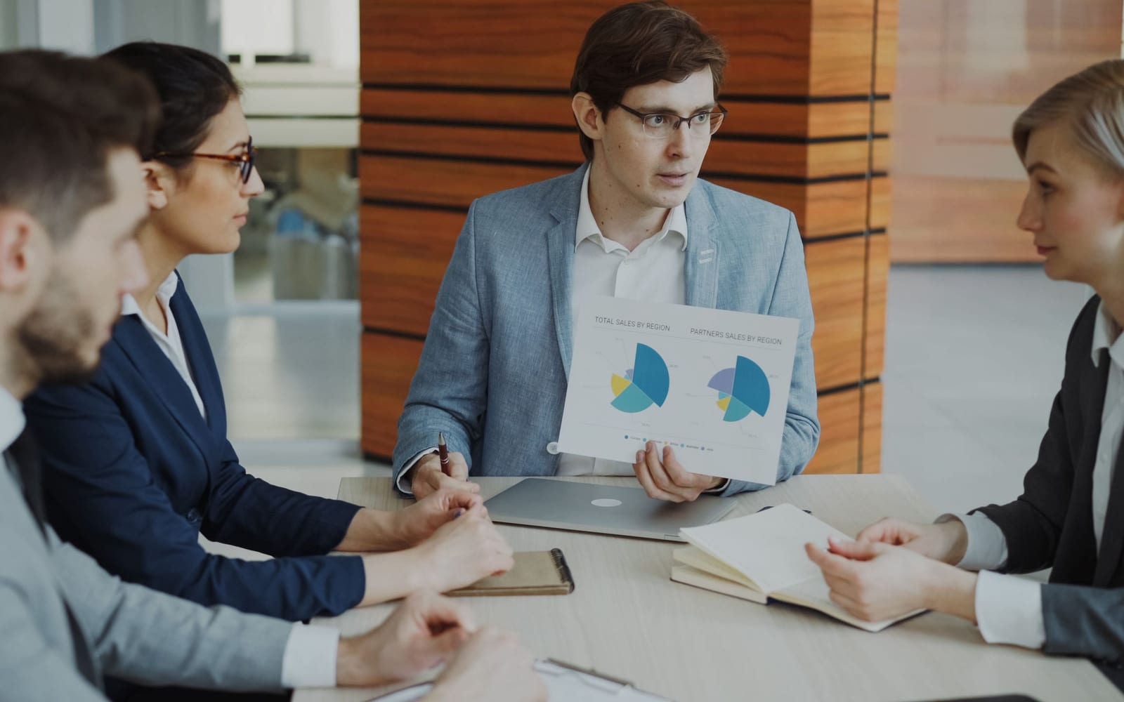 A marketing team working in a modern office.