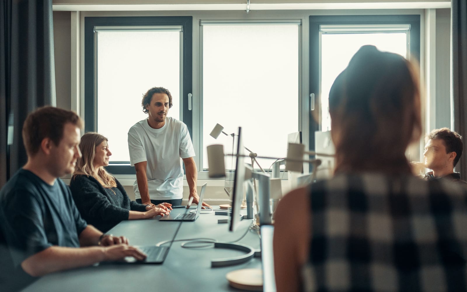 A marketing team working in a modern office.