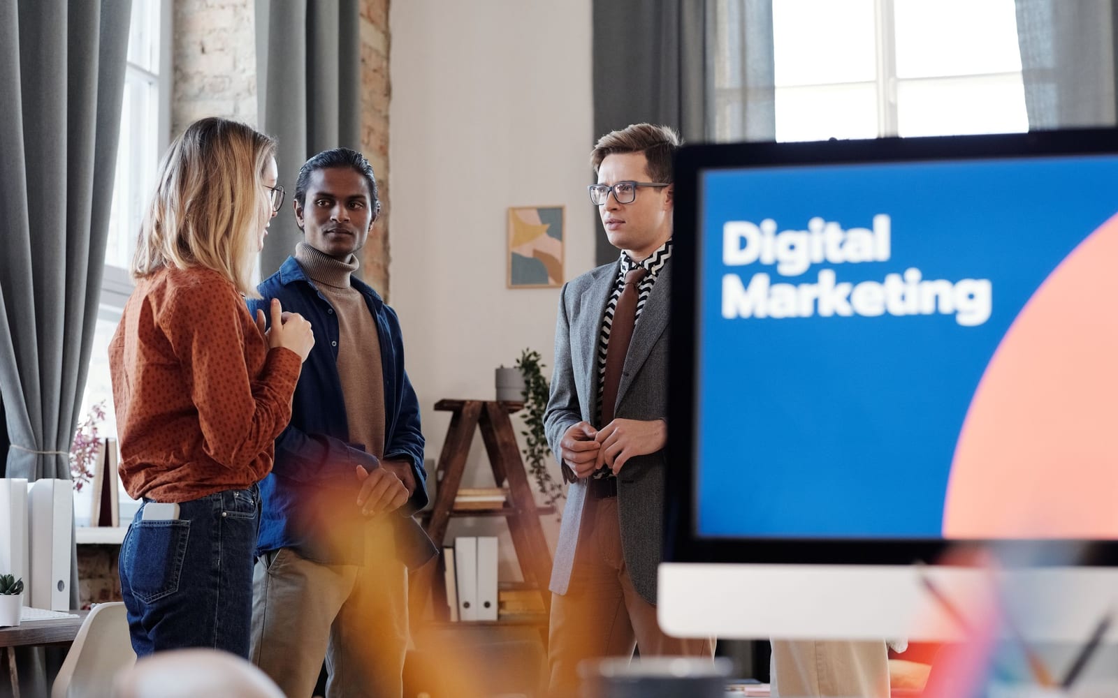 A marketing team working in a modern office.