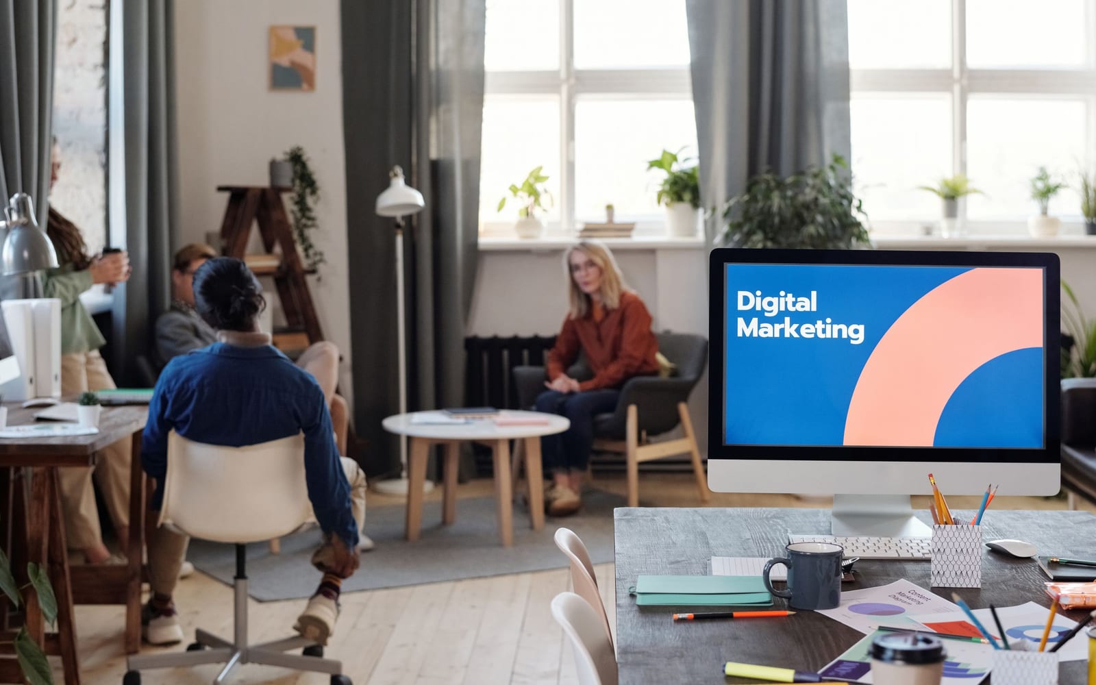 A marketing team working in a modern office.