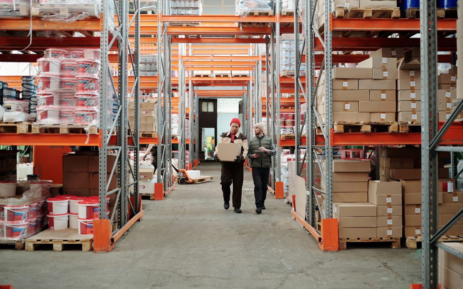Staff working a warehouse or retail floor.