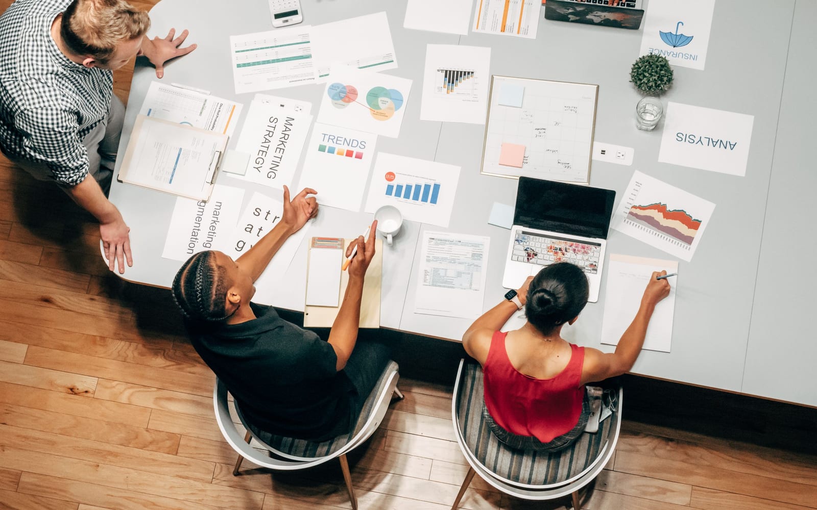A marketing team working in a modern office.