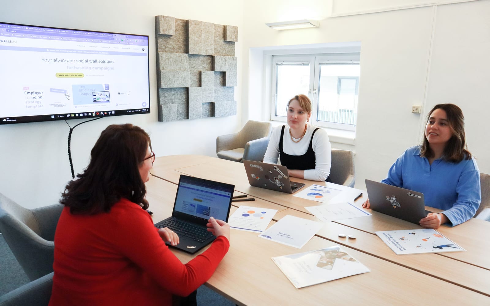 A marketing team working in a modern office.
