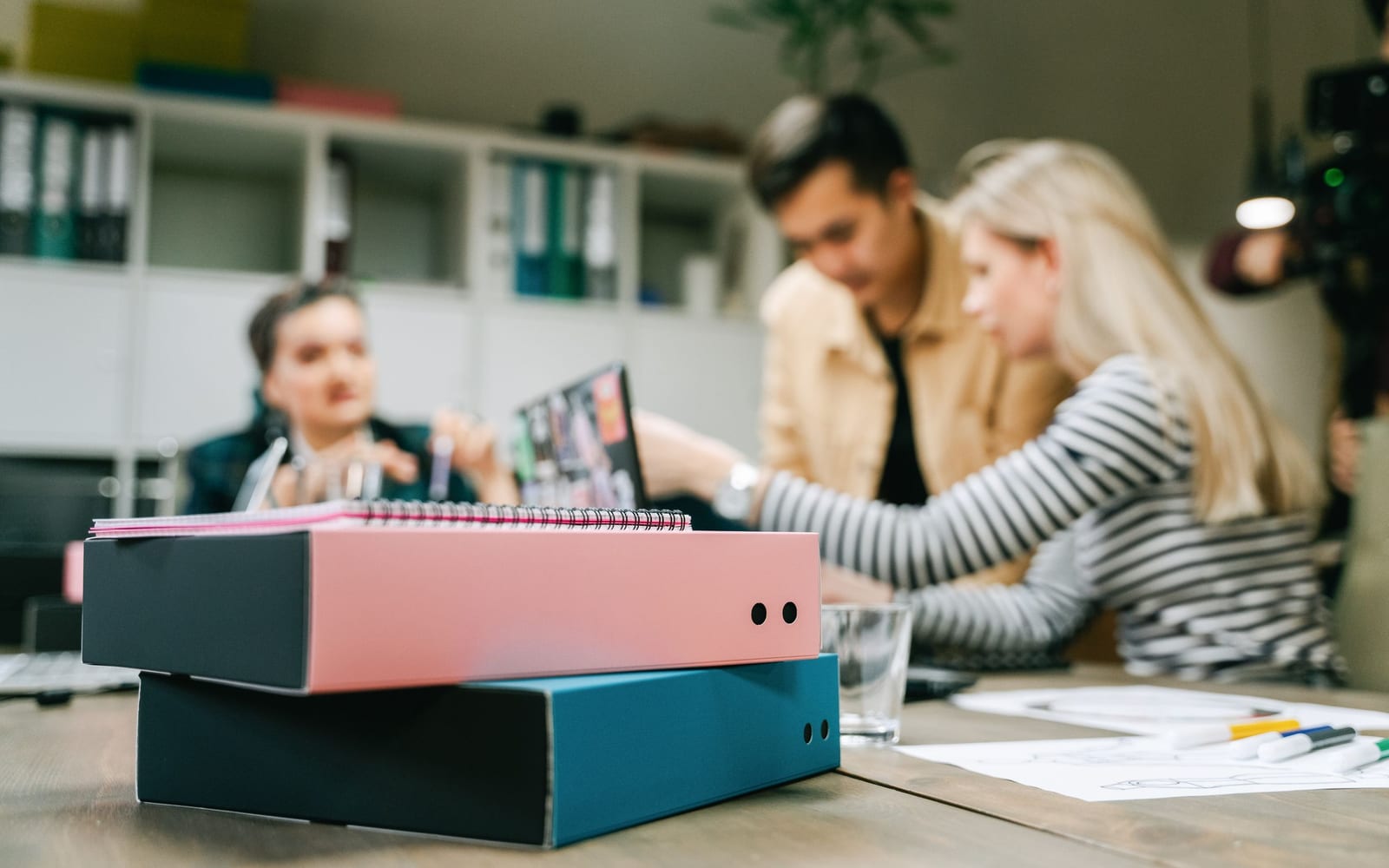A marketing team working in a modern office.