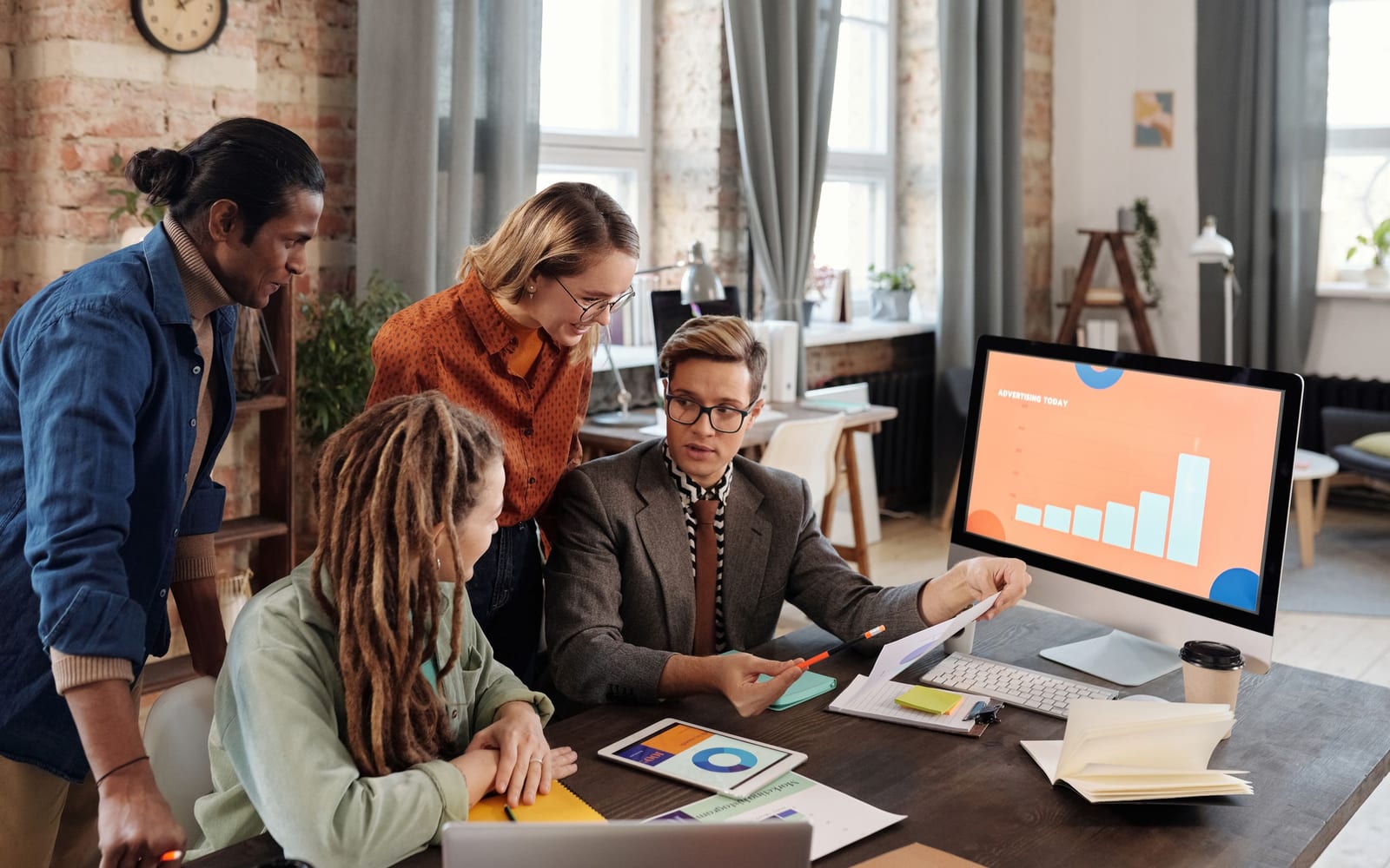 A marketing team working in a modern office.