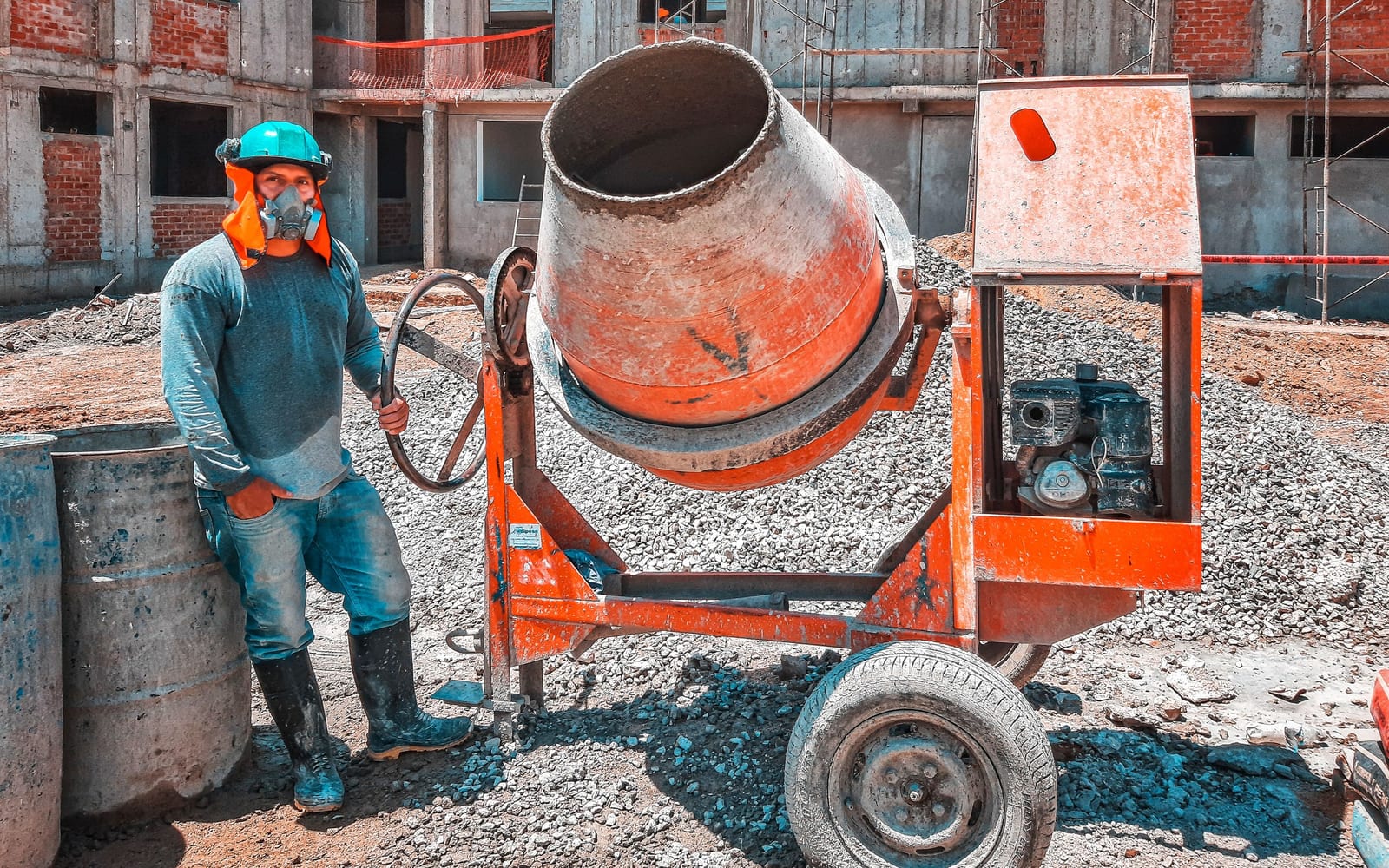 A technician using a tablet on a work site.