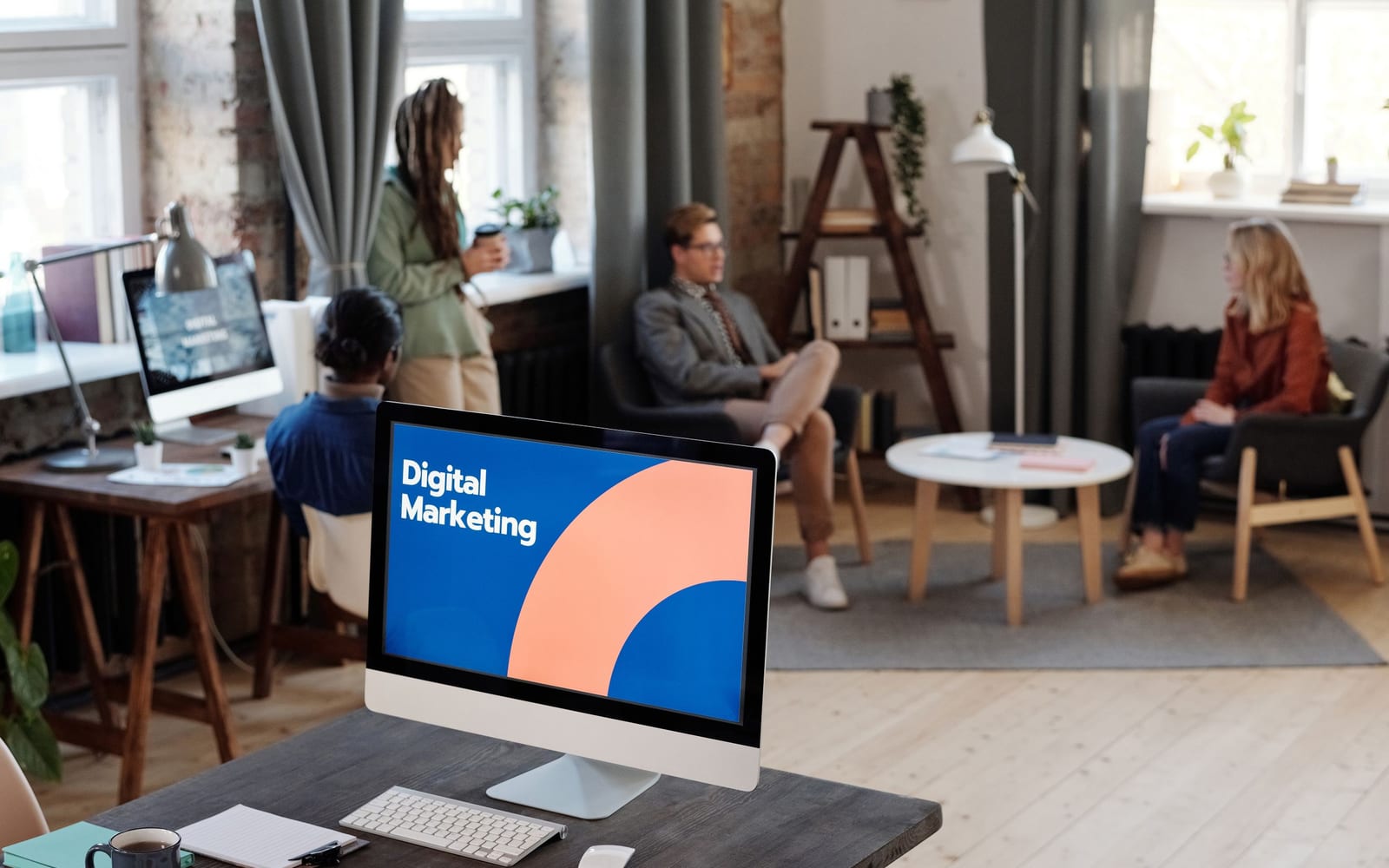 A marketing team working in a modern office.