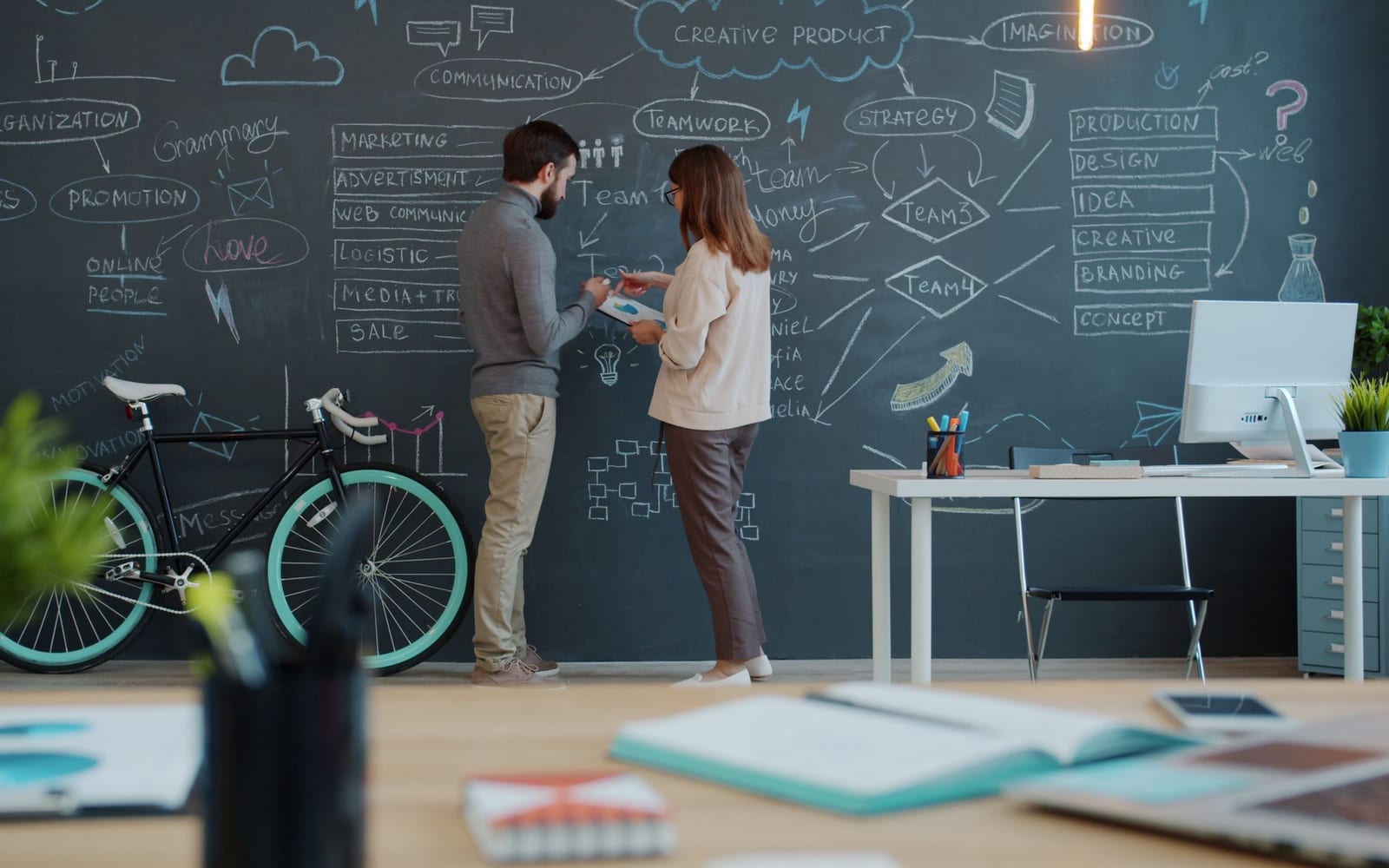 A marketing team working in a modern office.