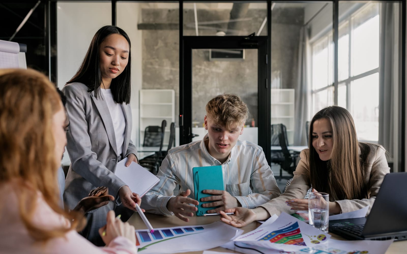 A marketing team working in a modern office.