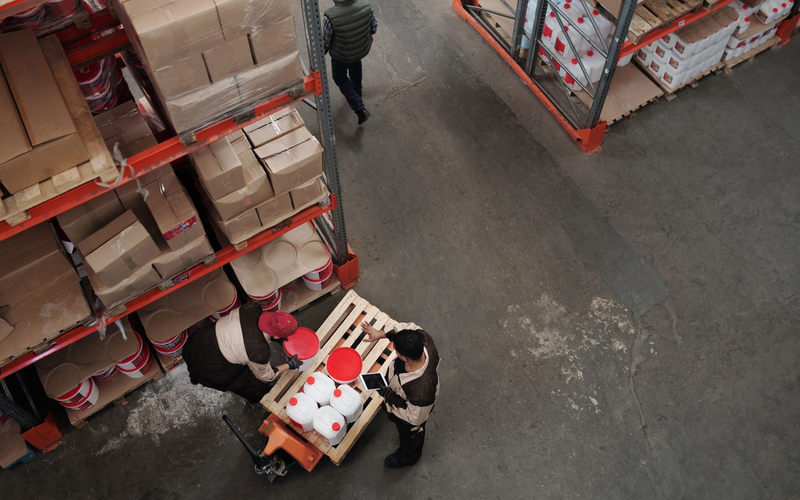 Staff working a warehouse or retail floor.