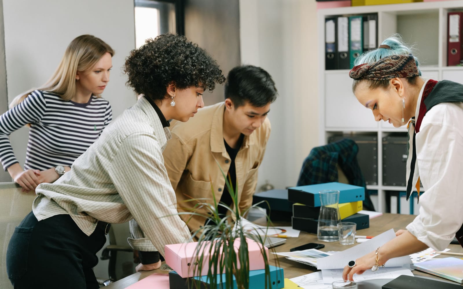 A marketing team working in a modern office.
