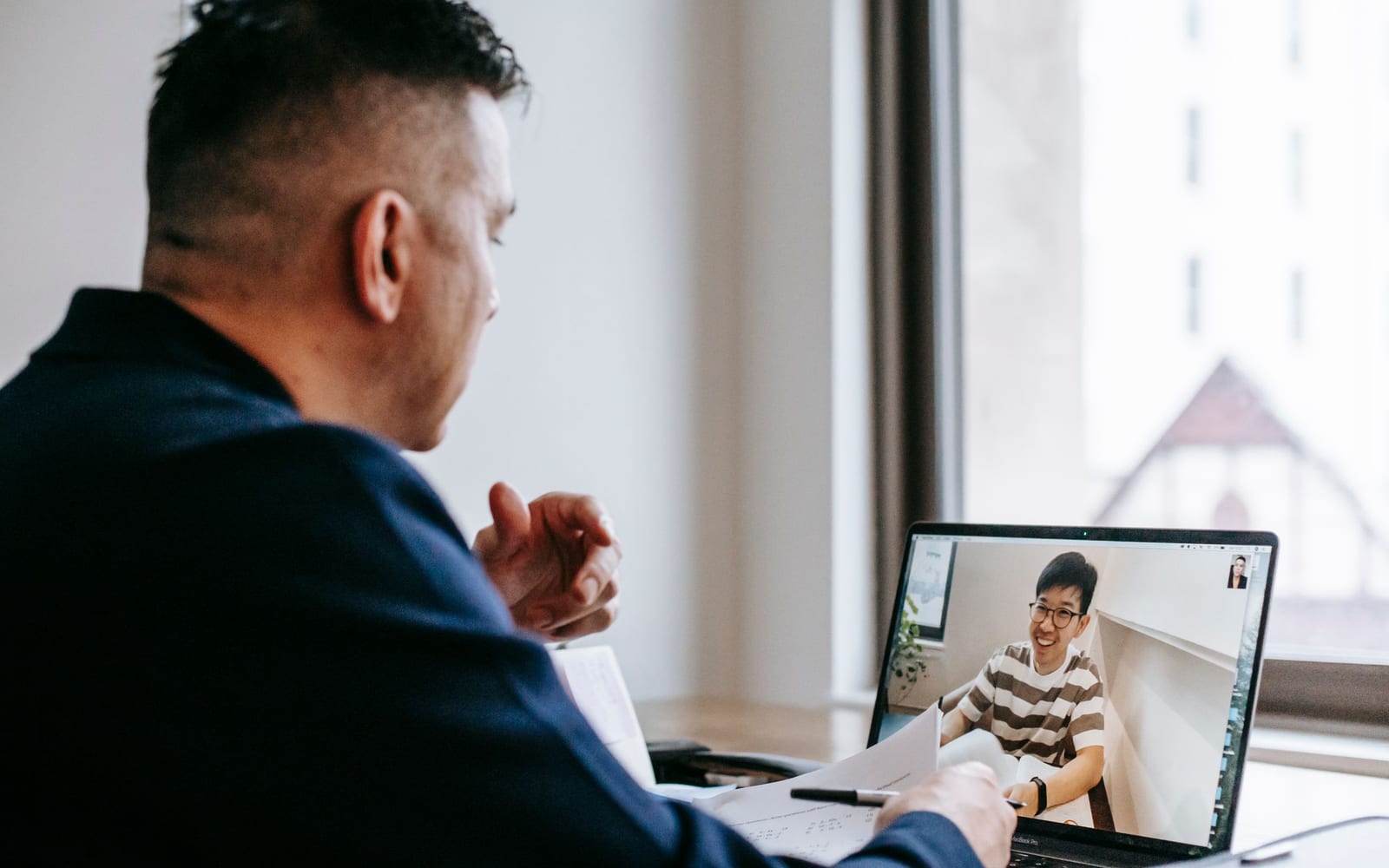 Colleagues working together in a modern office.