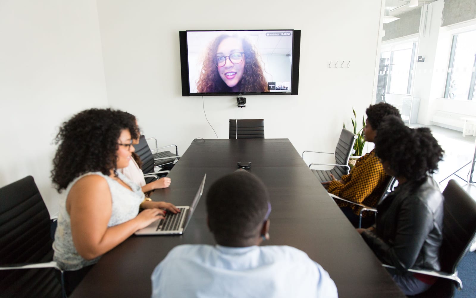 Colleagues working together in a modern office.