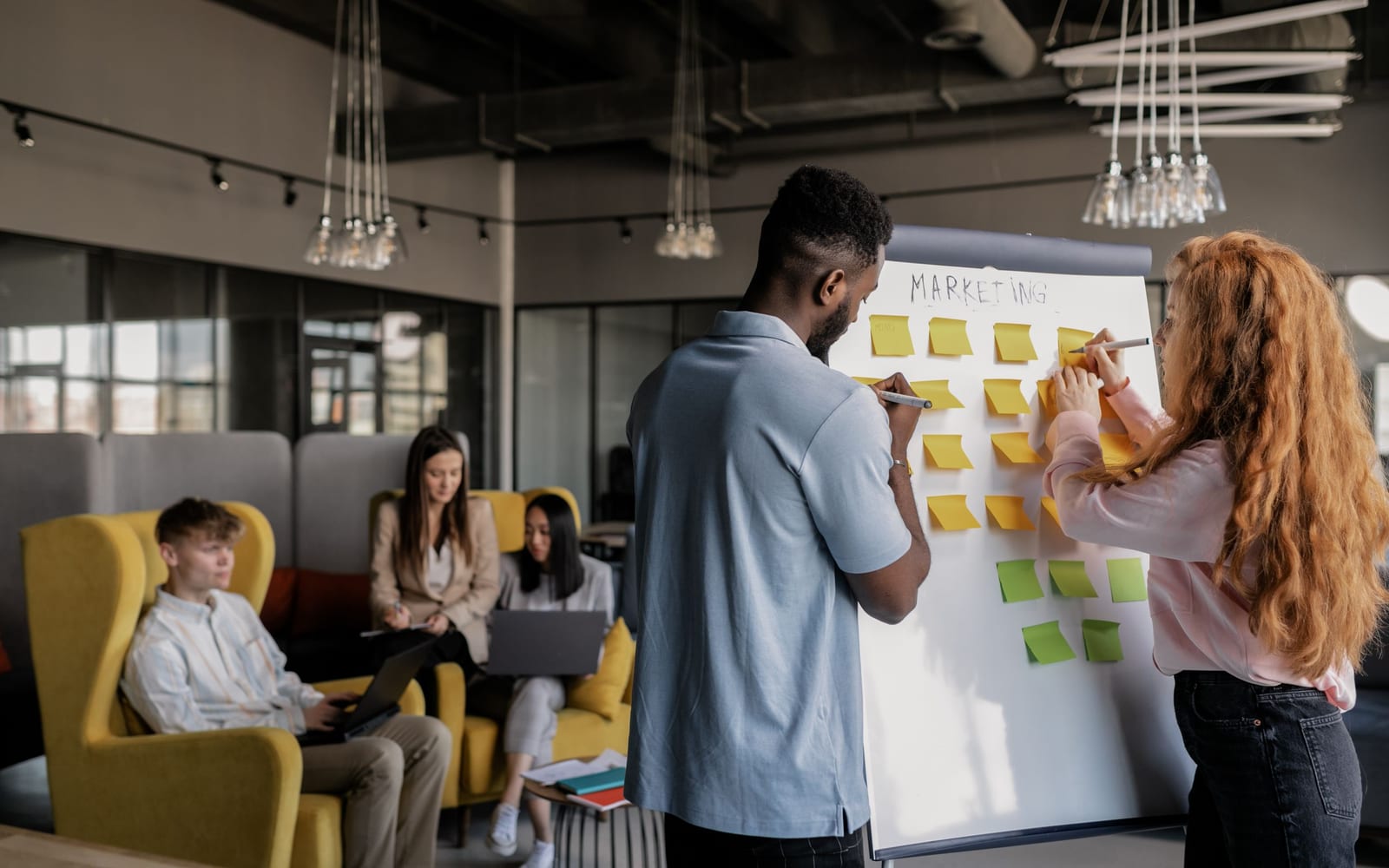 A marketing team working in a modern office.