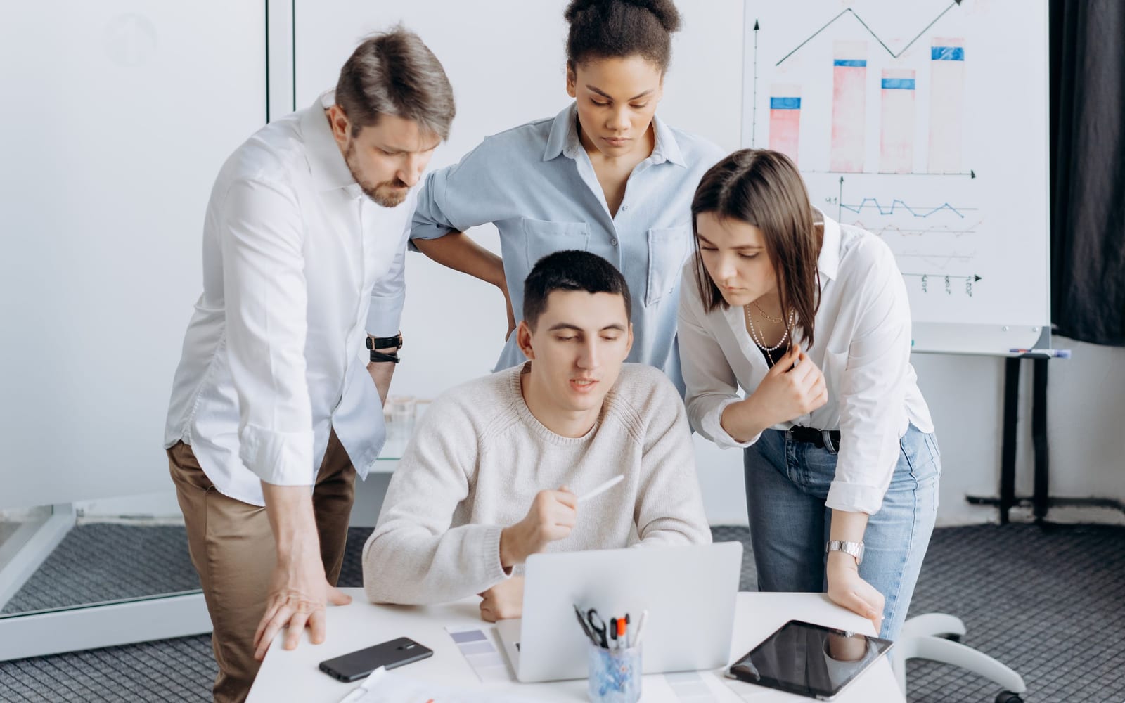 A marketing team working in a modern office.